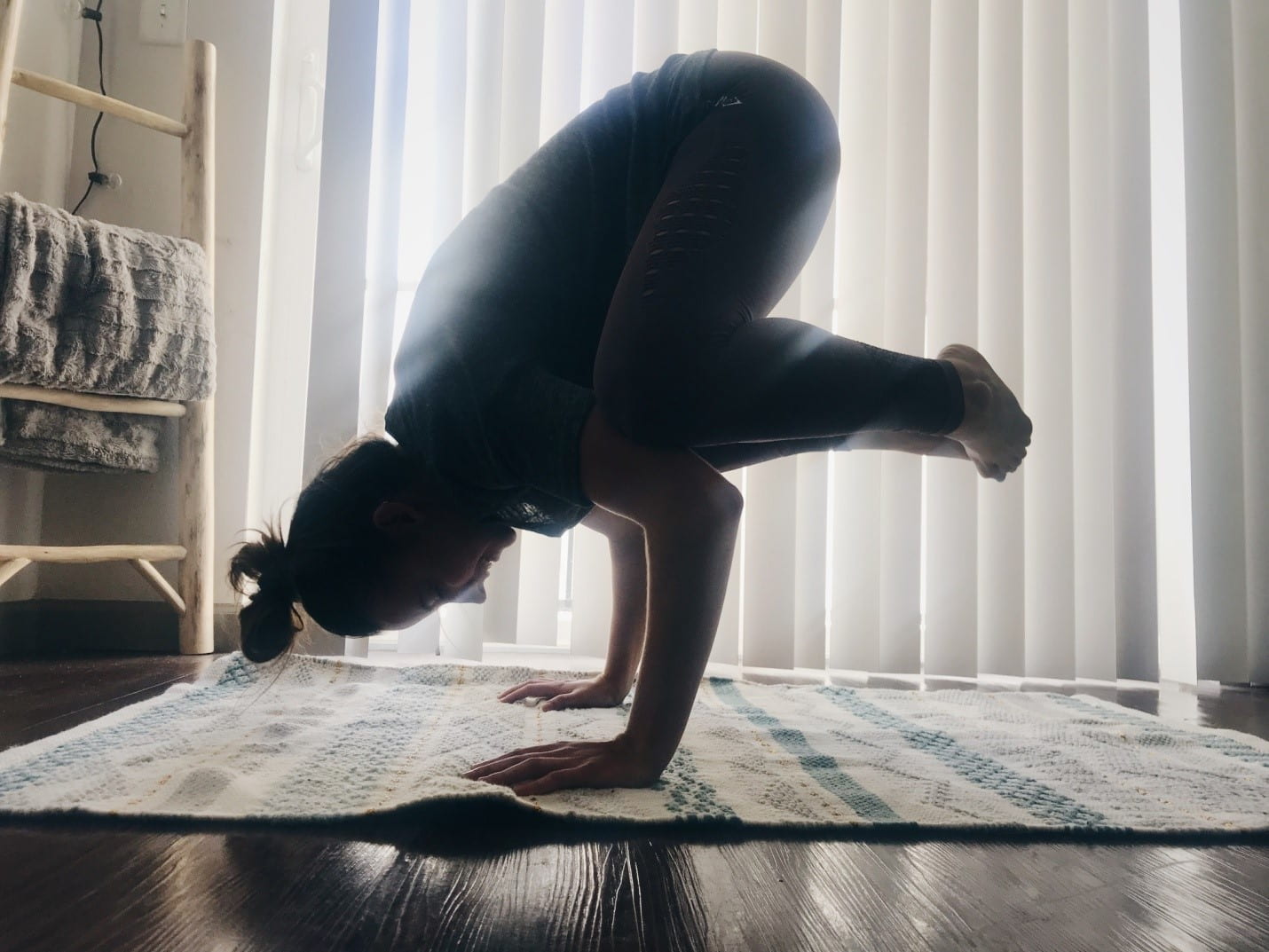 Woman in modified headstand pose